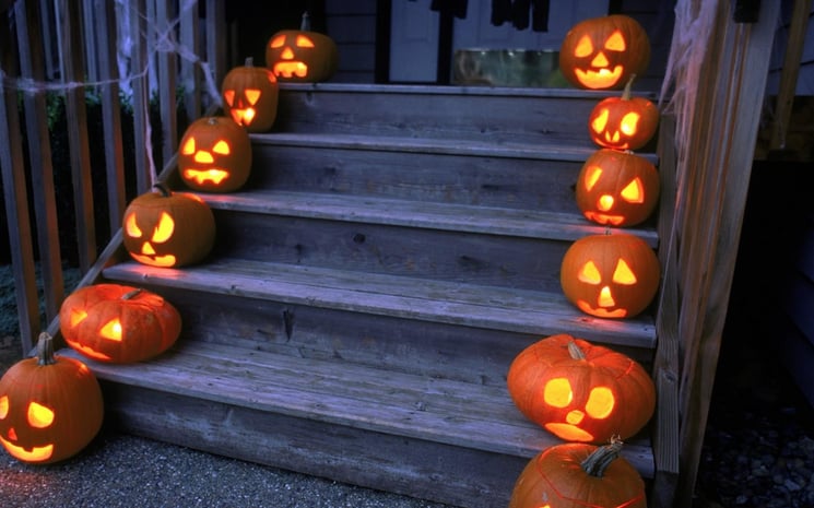 Safely provide an illuminated path by lining the walkway with carved Jack-o’-lanterns lit up with battery-operated tea lights instead of candles.