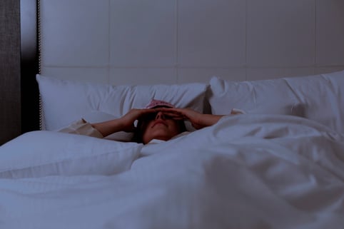woman-sleeping-in-hotel